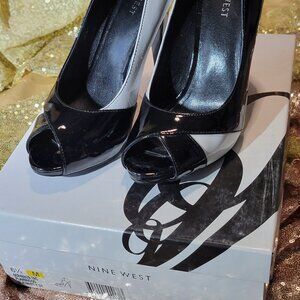 Women's back and white Nine West heals. Size 6.5 with 5 inch heel.